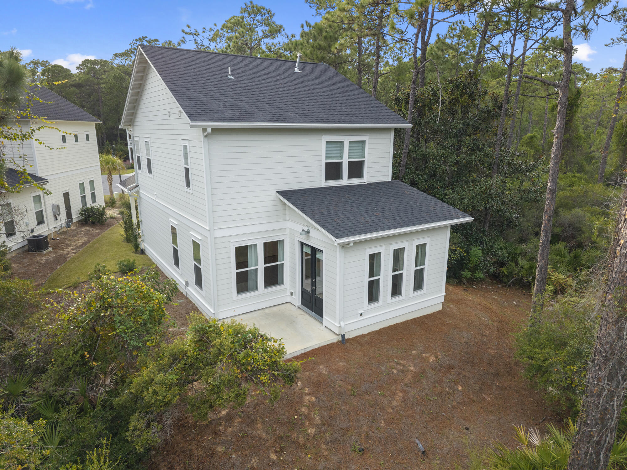248 Euvino Way Santa Rosa Beach, FL 32459 - Photo 46 of 56 a view of a house with balcony and yard