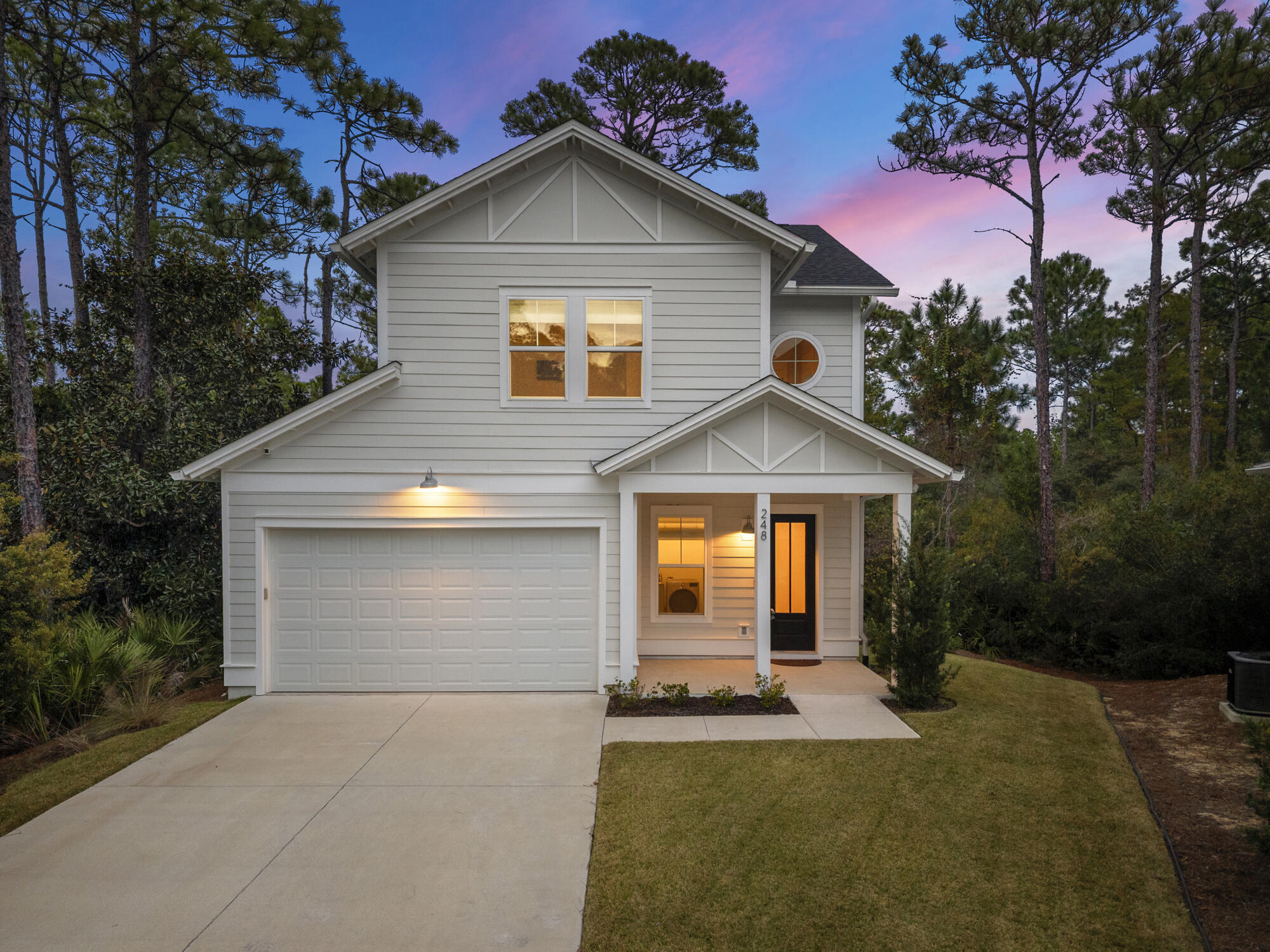 248 Euvino Way Santa Rosa Beach, FL 32459 - Photo 50 of 56 a front view of house with yard and green space