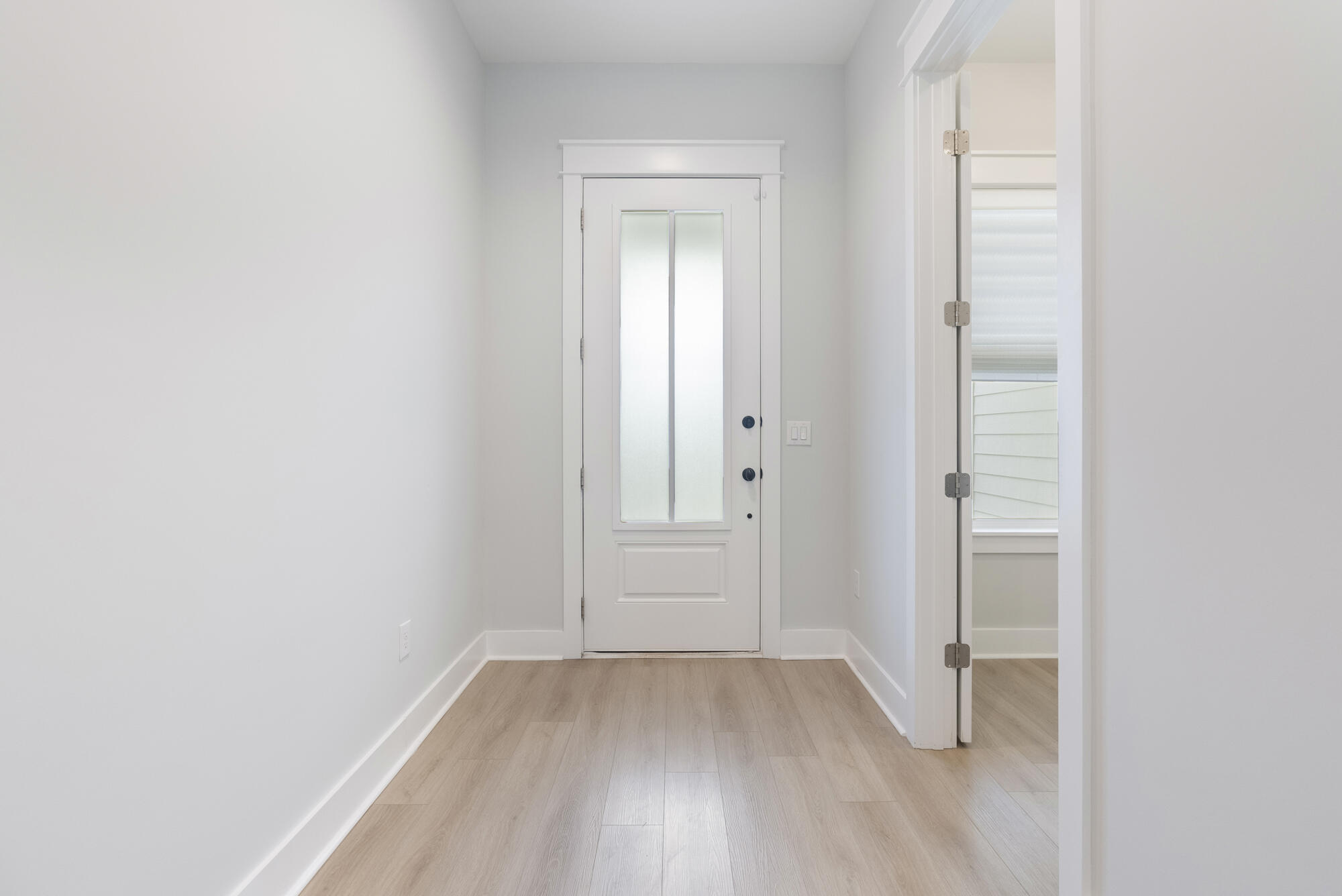 248 Euvino Way Santa Rosa Beach, FL 32459 - Photo 10 of 56 an empty room with wooden floor and closet