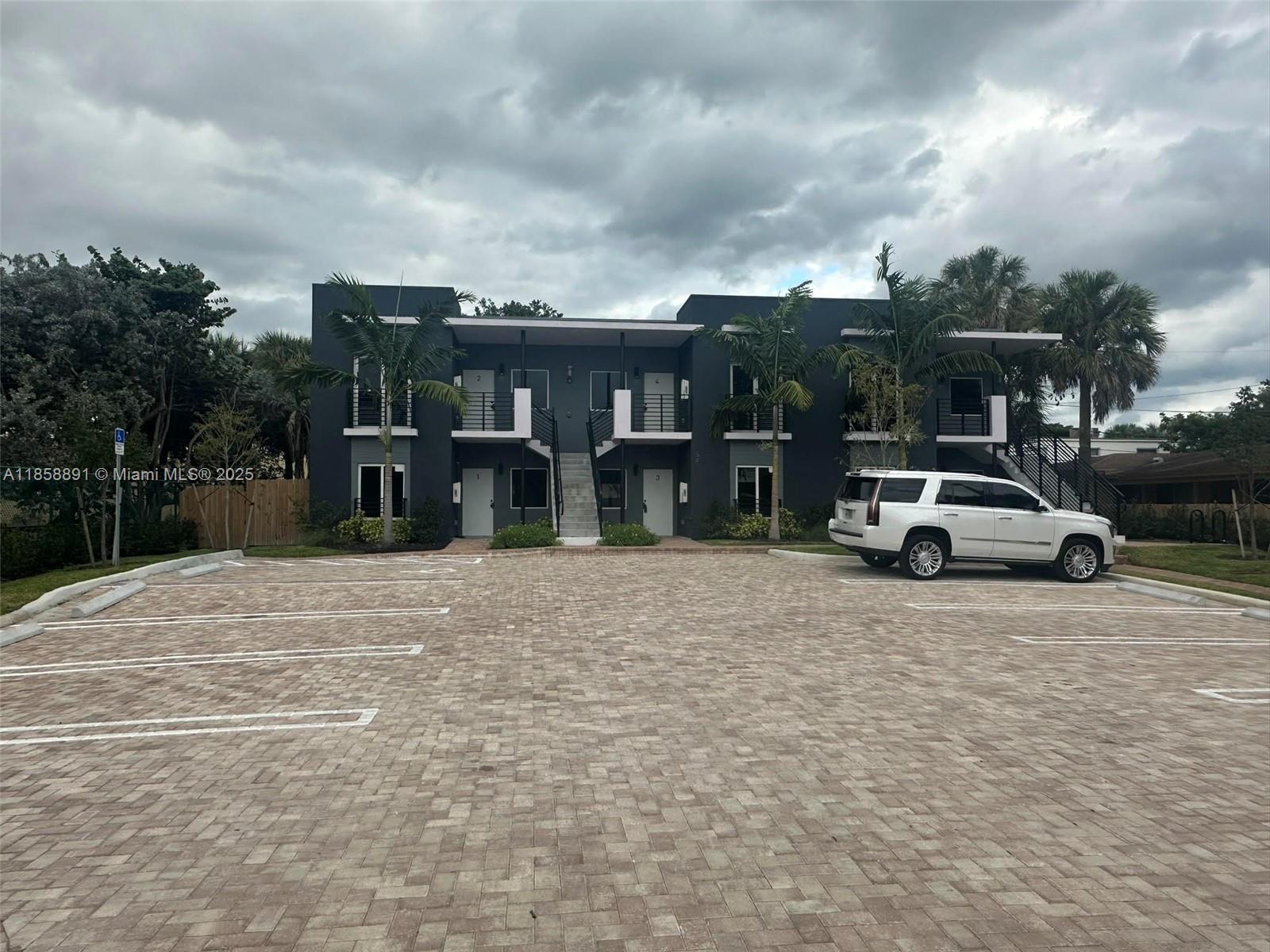 a view of car parked in parking lot at street