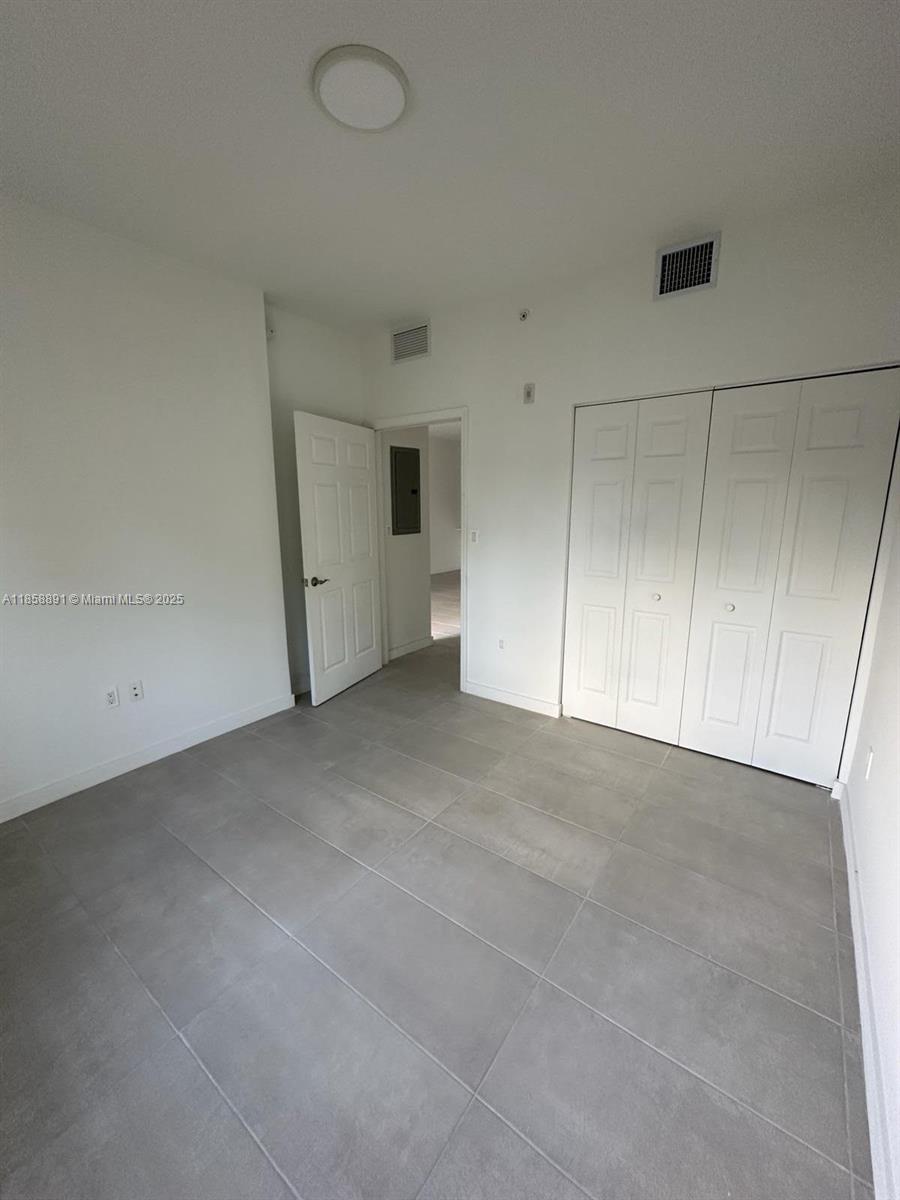 541 Southwest 2nd Court, Unit 5 Pompano Beach, FL 33060 - Photo 6 of 20 a view of an empty room