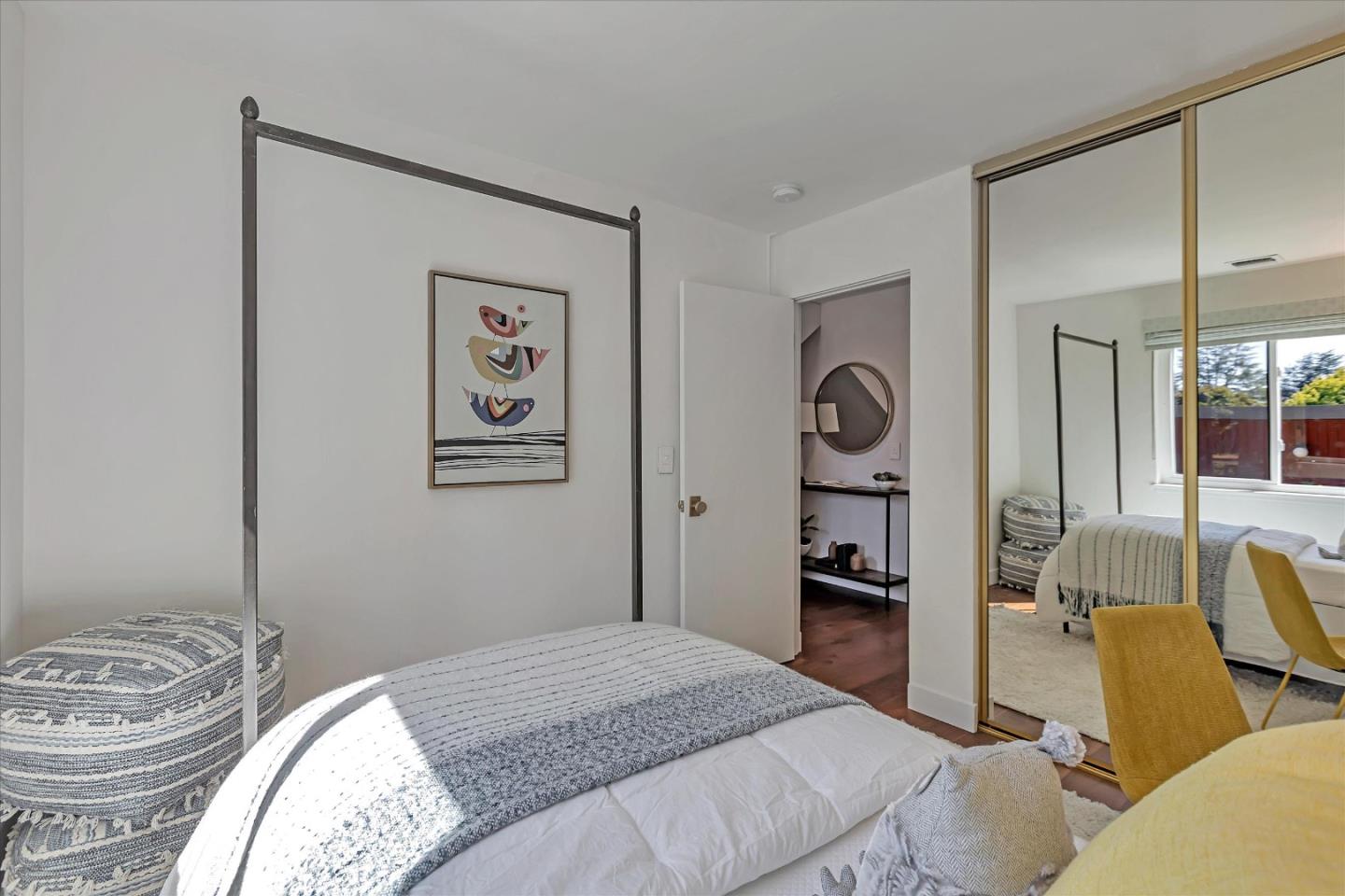 202 Central Avenue Mountain View, CA 94043 - Photo 14 of 39 a bedroom with a bed and a flat tv screen