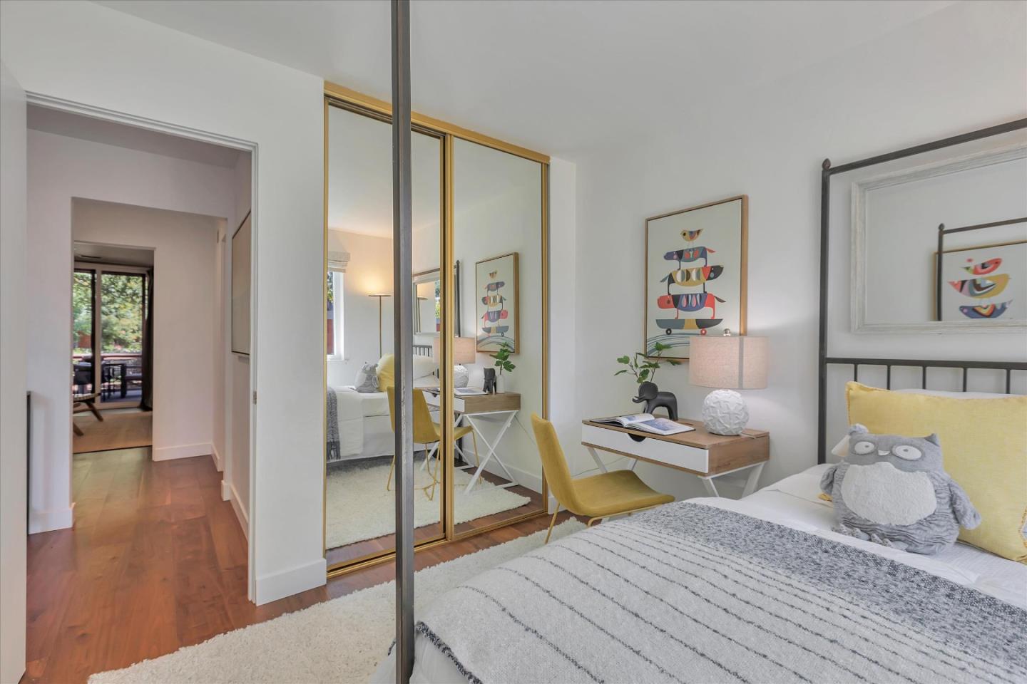 202 Central Avenue Mountain View, CA 94043 - Photo 15 of 39 a bedroom with a bed and wooden floor