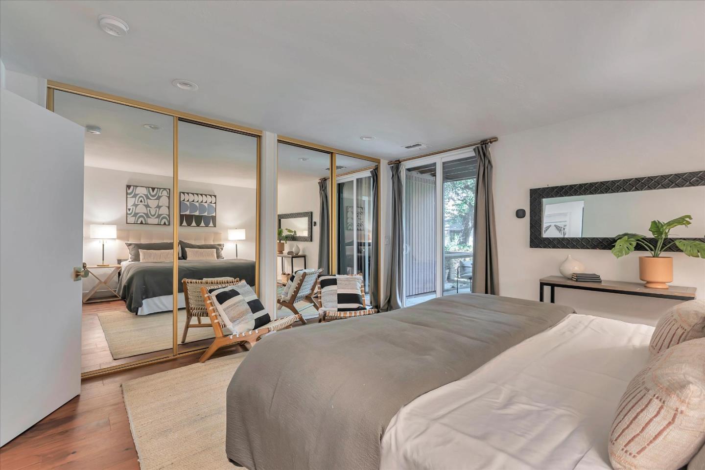 202 Central Avenue Mountain View, CA 94043 - Photo 18 of 39 a bed room with a bed and a mirror