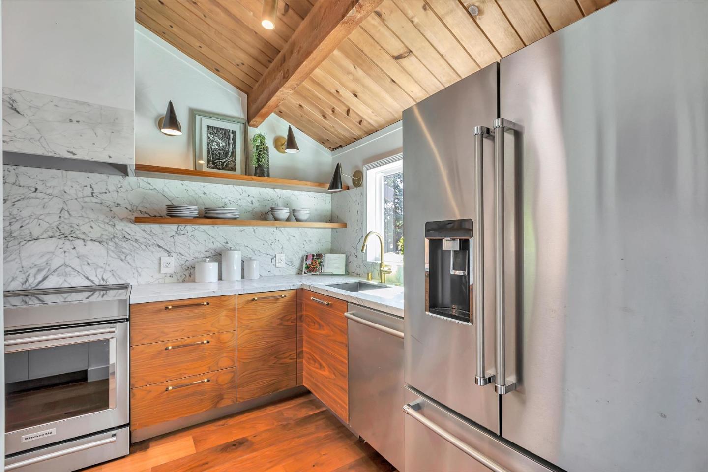 202 Central Avenue Mountain View, CA 94043 - Photo 5 of 39 a kitchen with stainless steel appliances granite countertop a refrigerator and a stove