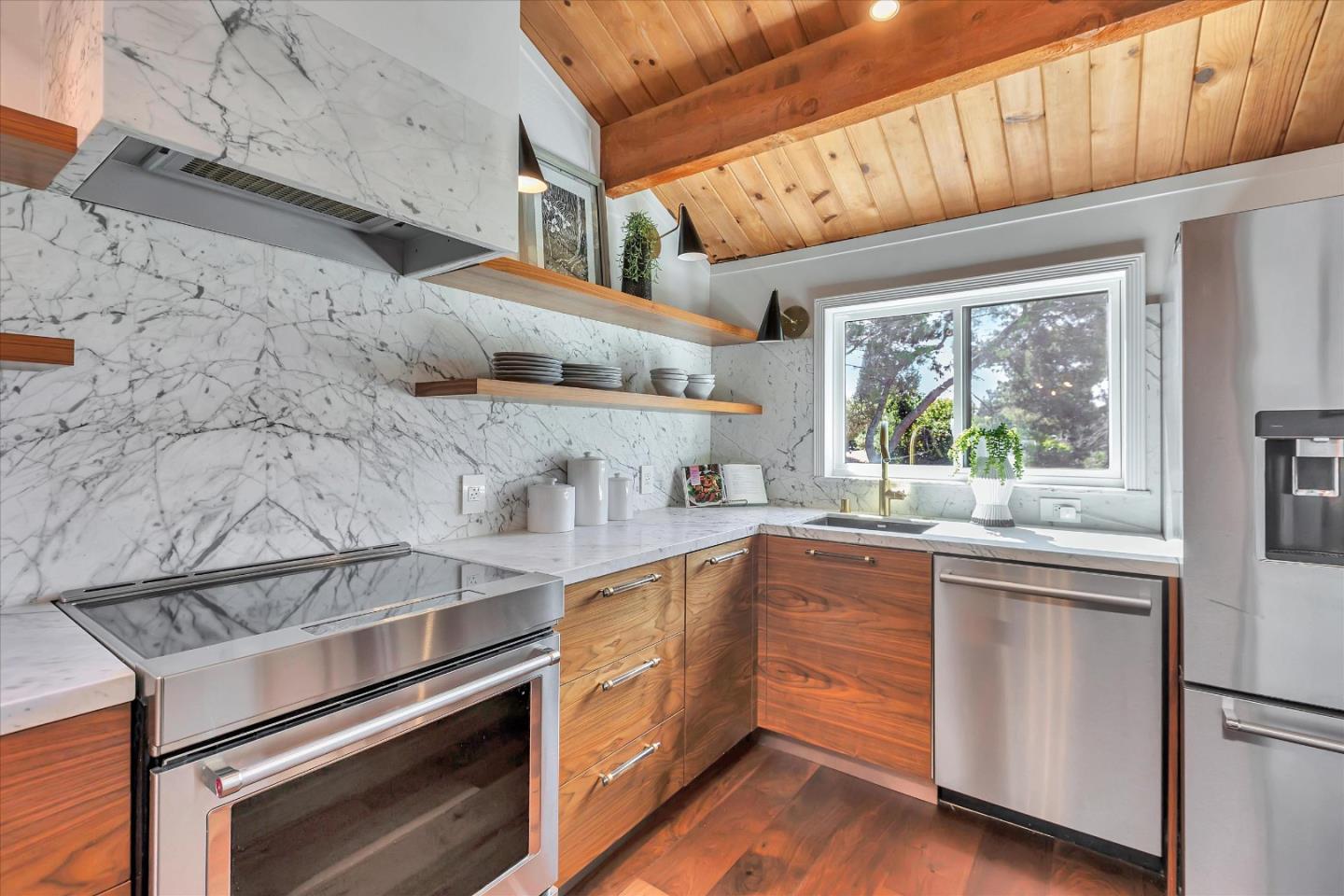 202 Central Avenue Mountain View, CA 94043 - Photo 9 of 39 a kitchen with stainless steel appliances granite countertop a stove and cabinets