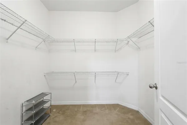 a view of a room with racks on the wall