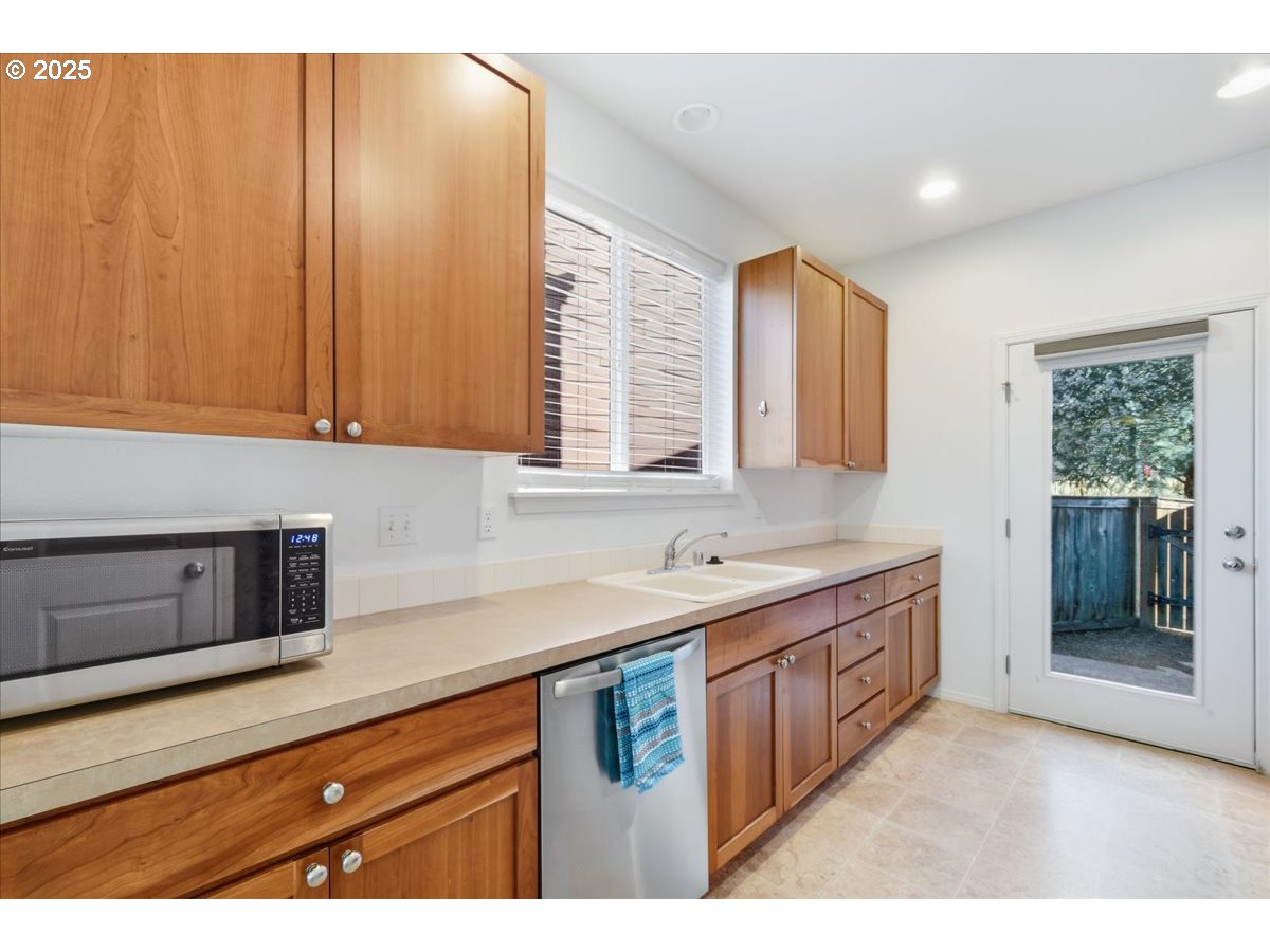 3527 Southeast 197th Avenue Camas, WA 98607 - Photo 13 of 38 a kitchen with a sink cabinets and window