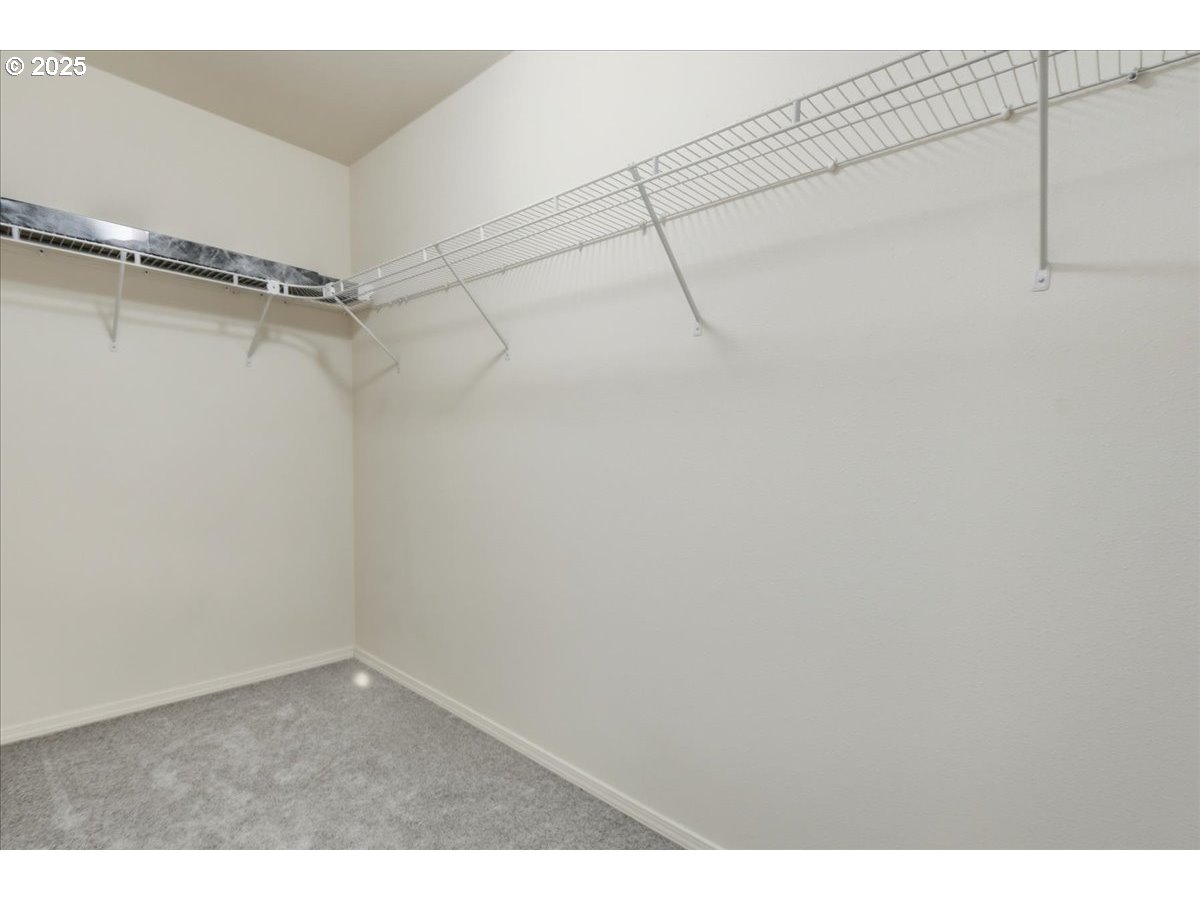 3527 Southeast 197th Avenue Camas, WA 98607 - Photo 19 of 38 a view of a room with racks on the wall