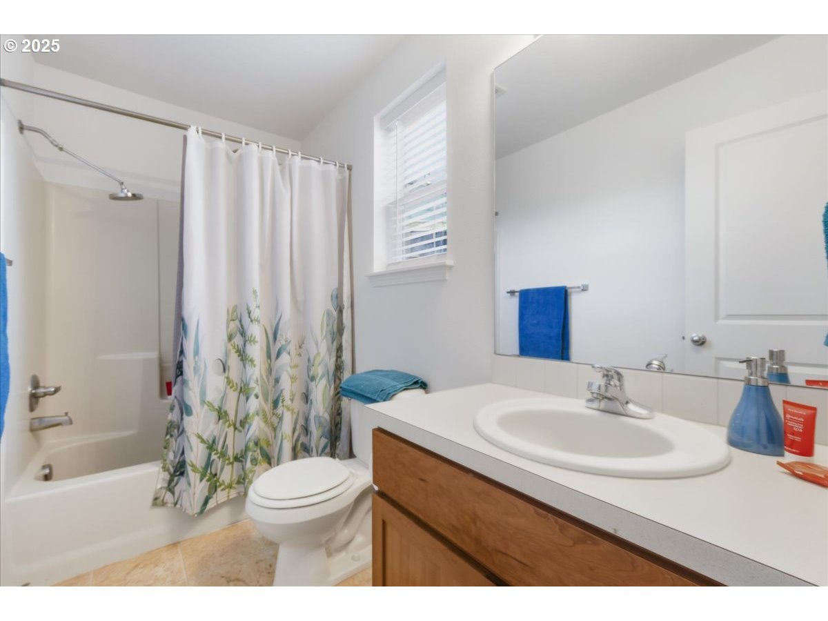 3527 Southeast 197th Avenue Camas, WA 98607 - Photo 28 of 38 a bathroom with a sink toilet and shower