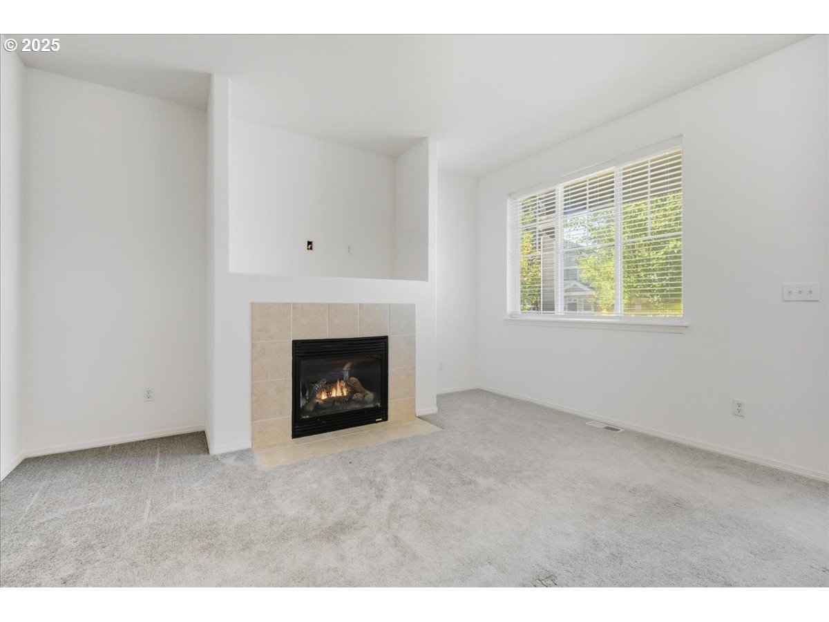 3527 Southeast 197th Avenue Camas, WA 98607 - Photo 7 of 38 a view of an empty room with a window