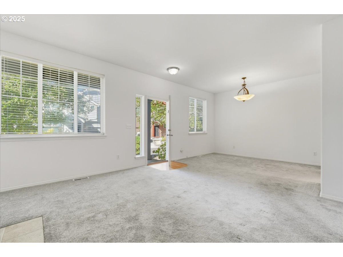 3527 Southeast 197th Avenue Camas, WA 98607 - Photo 8 of 38 a view of an empty room with a window