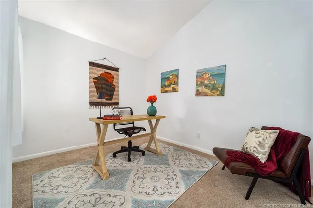 a view of balcony with chairs