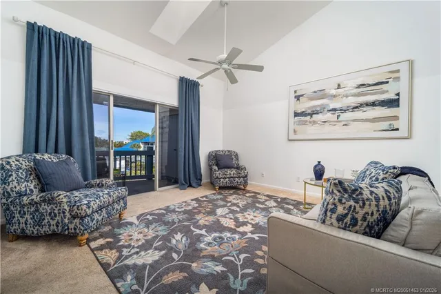 a kitchen with a stove a sink and a refrigerator