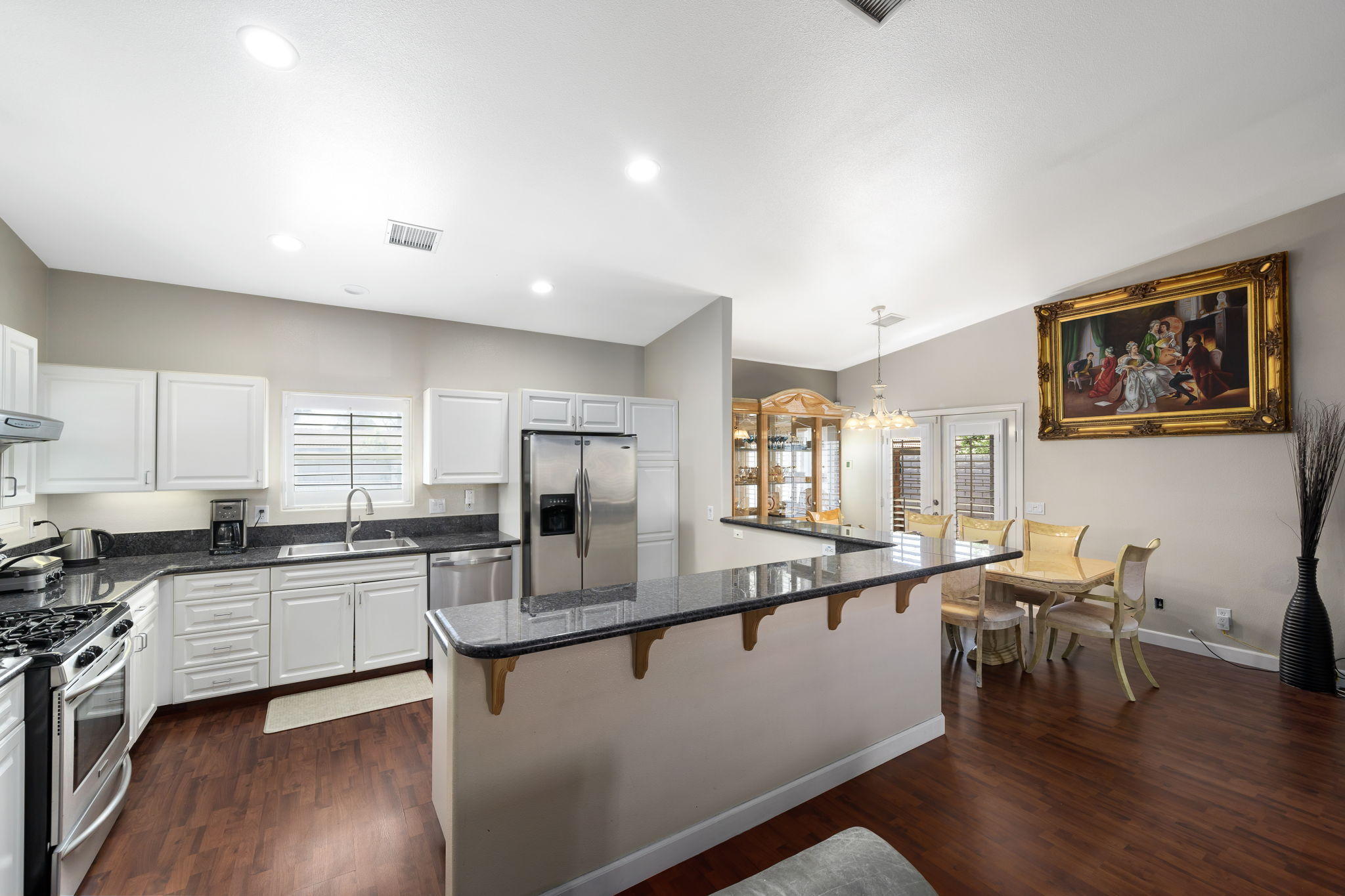 2120 West Nicola Road Palm Springs, CA 92262 - Photo 12 of 37 a large kitchen with lots of counter space a sink and appliances