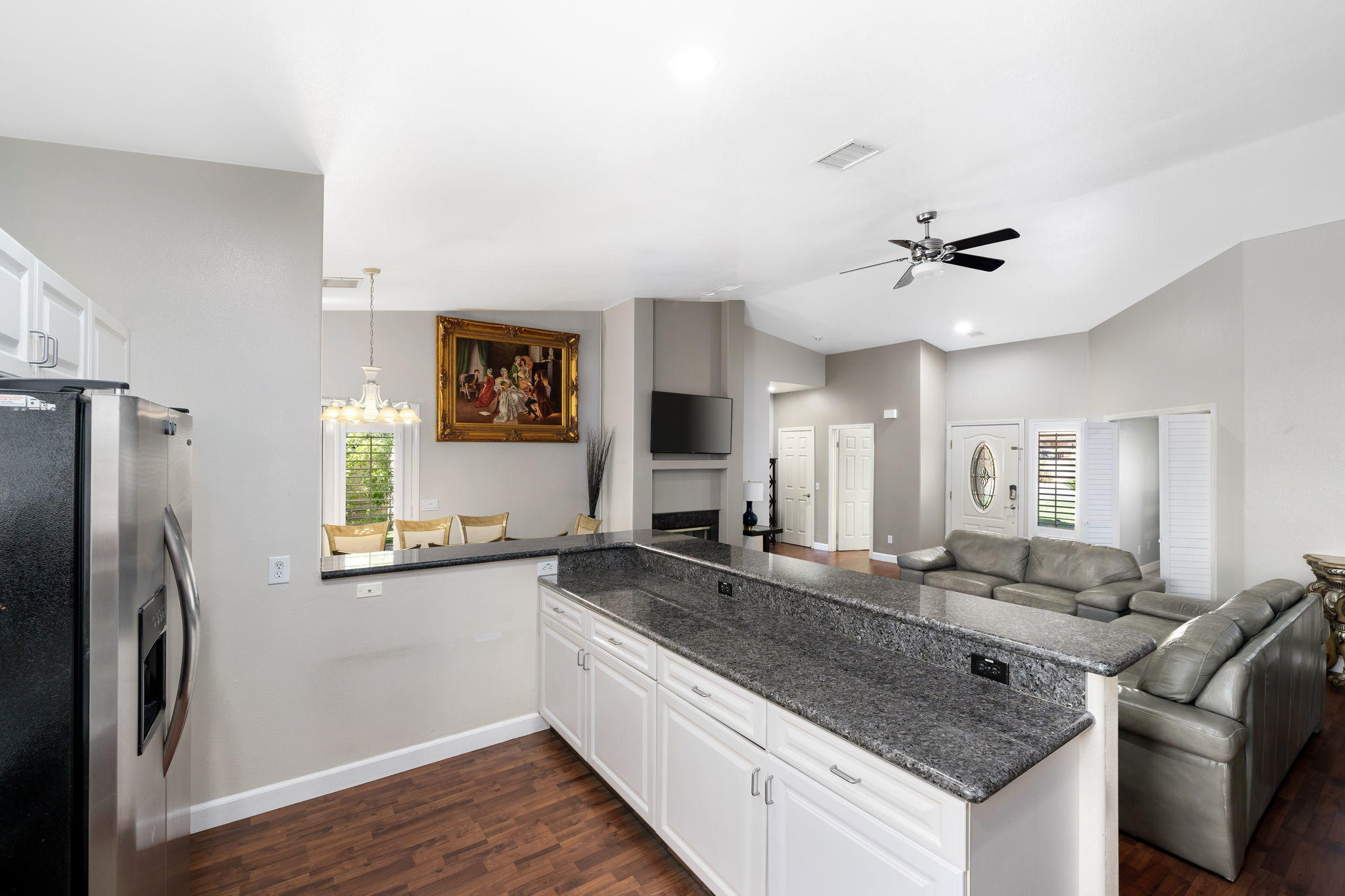2120 West Nicola Road Palm Springs, CA 92262 - Photo 16 of 37 a kitchen with stainless steel appliances granite countertop a sink refrigerator and cabinets