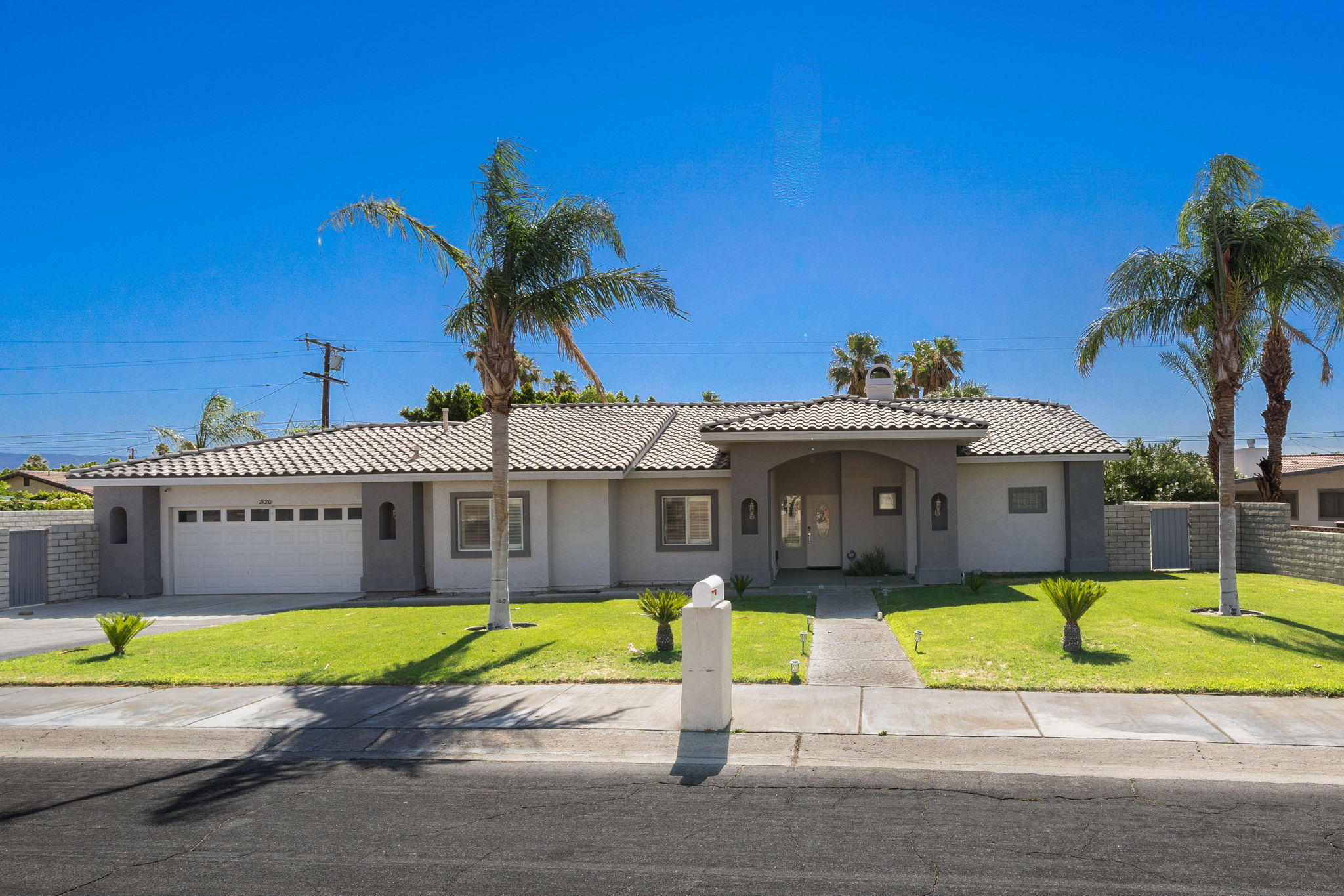 2120 West Nicola Road Palm Springs, CA 92262 - Photo 2 of 37 a view of a house with a swimming pool
