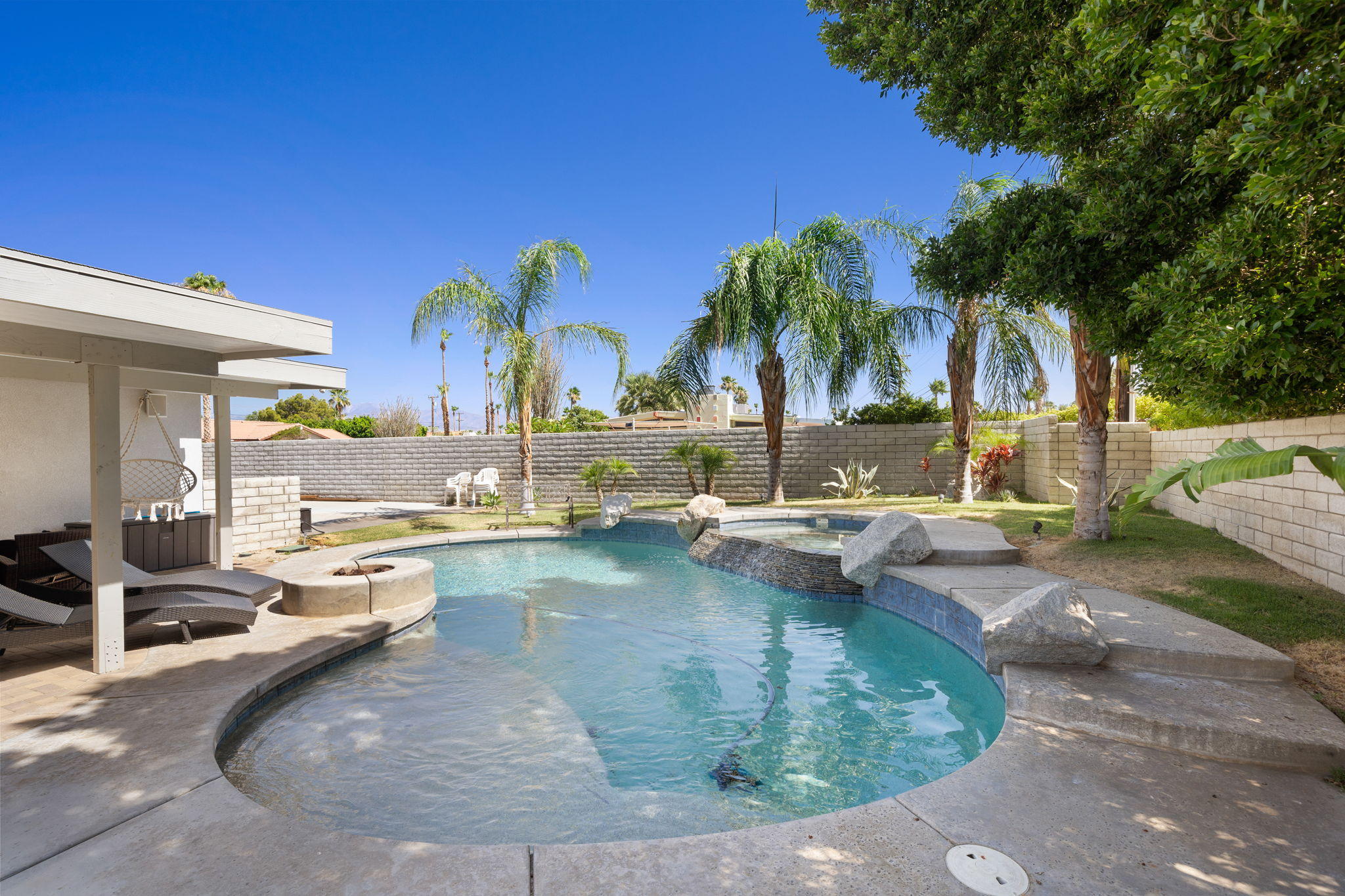 2120 West Nicola Road Palm Springs, CA 92262 - Photo 28 of 37 a view of a swimming pool with outdoor seating