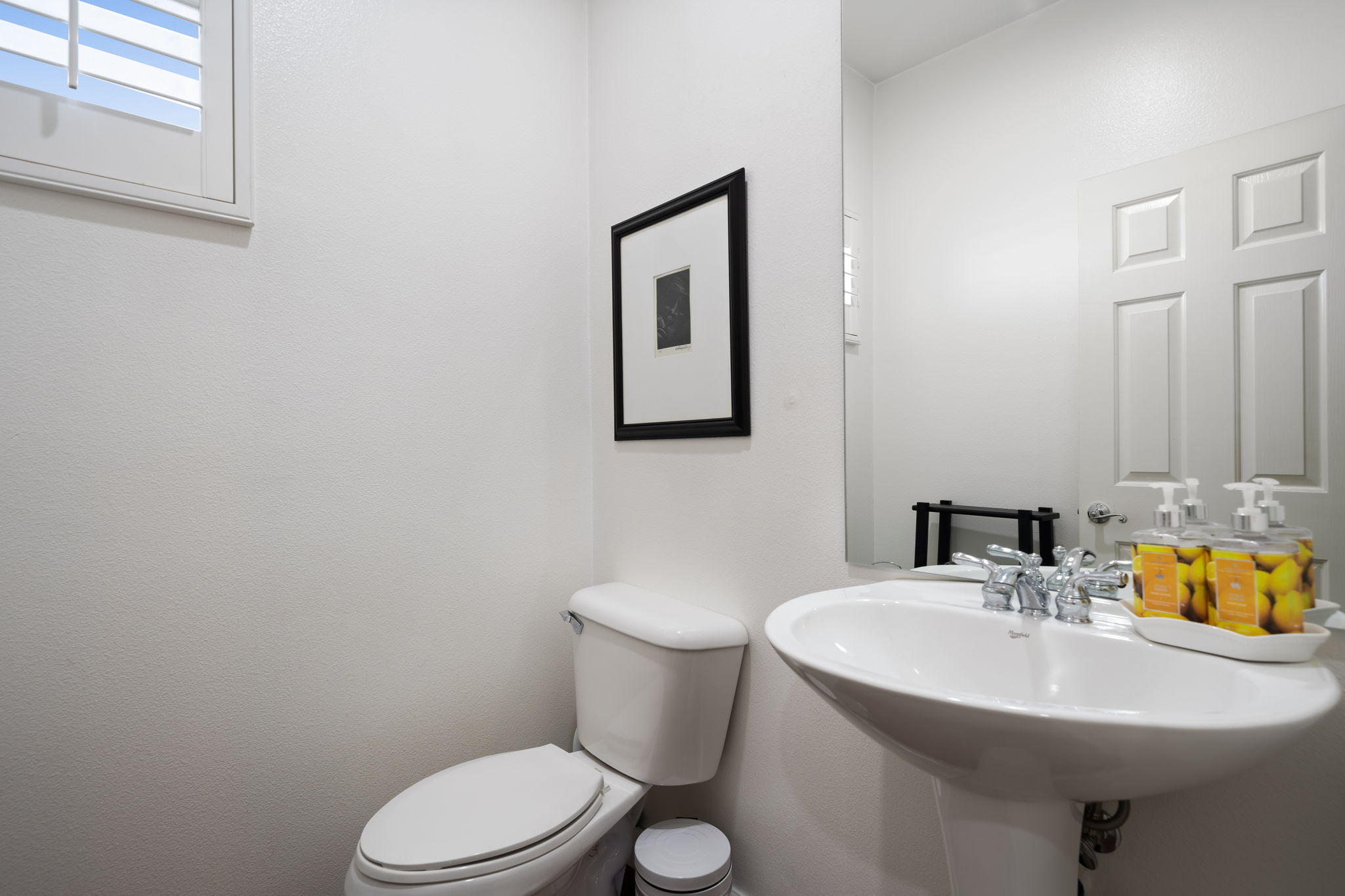2120 West Nicola Road Palm Springs, CA 92262 - Photo 32 of 37 a bathroom with a sink a toilet and mirror