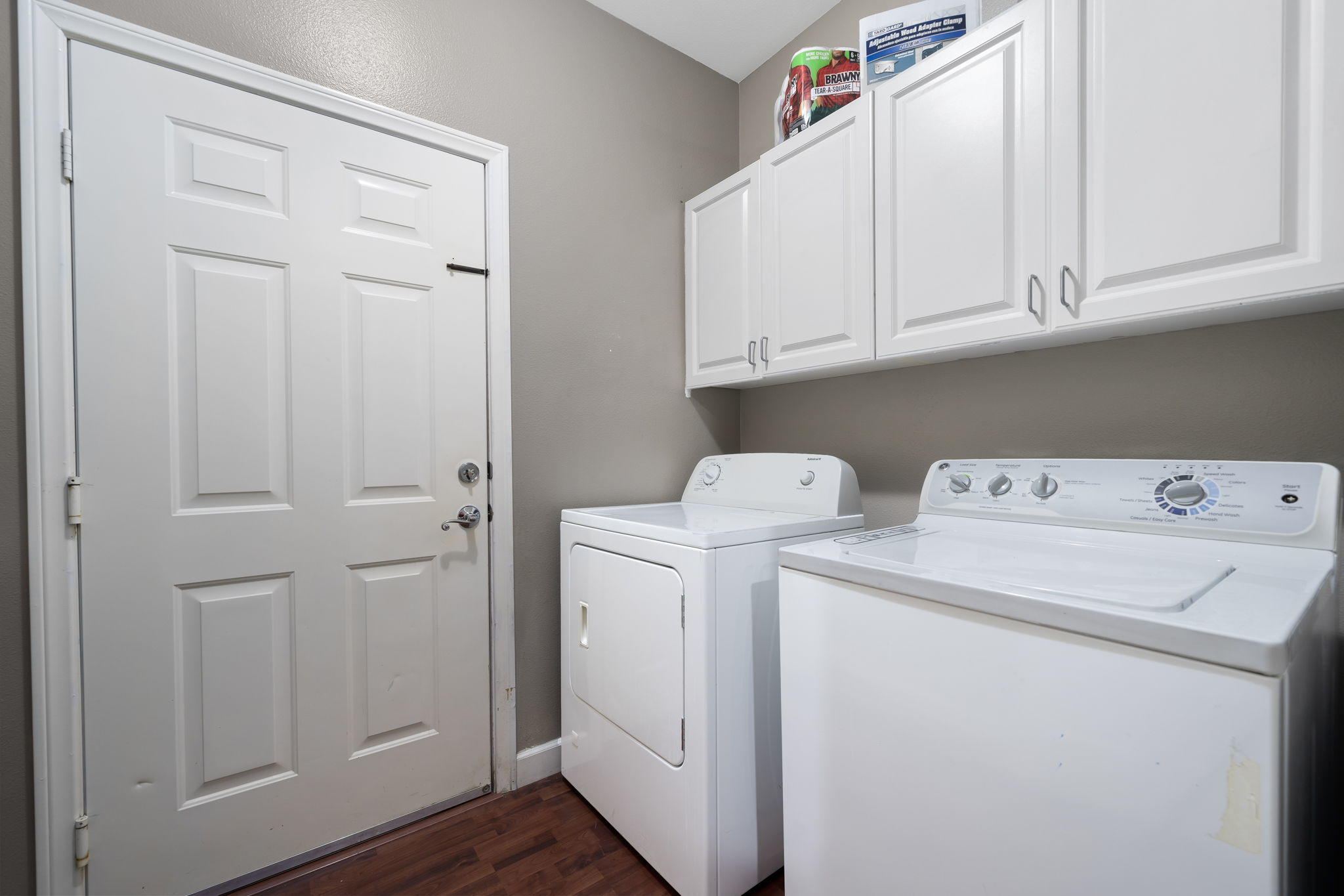 2120 West Nicola Road Palm Springs, CA 92262 - Photo 37 of 37 a view of storage and utility room with washer and dryer