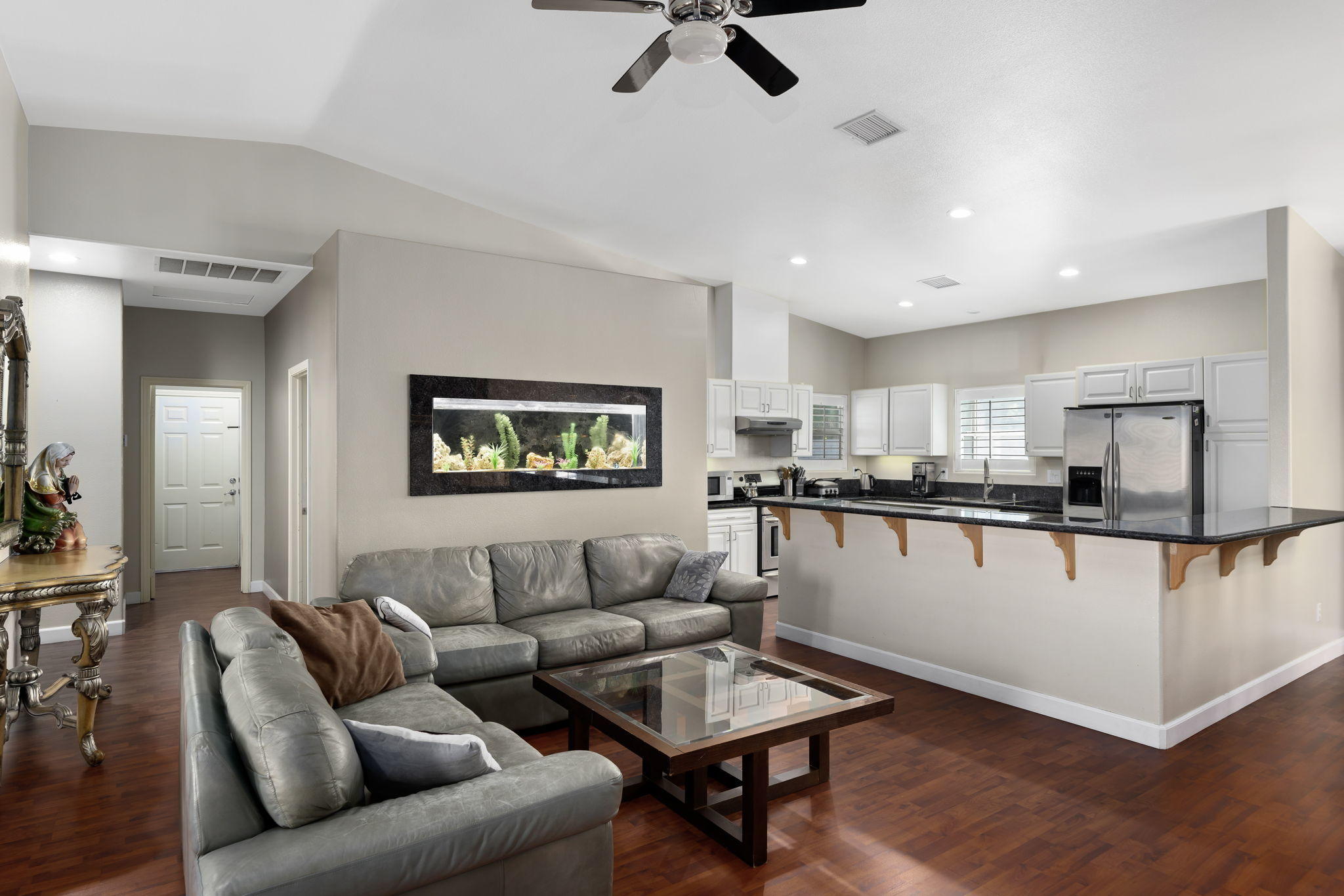 2120 West Nicola Road Palm Springs, CA 92262 - Photo 7 of 37 a living room with stainless steel appliances furniture and a view of kitchen