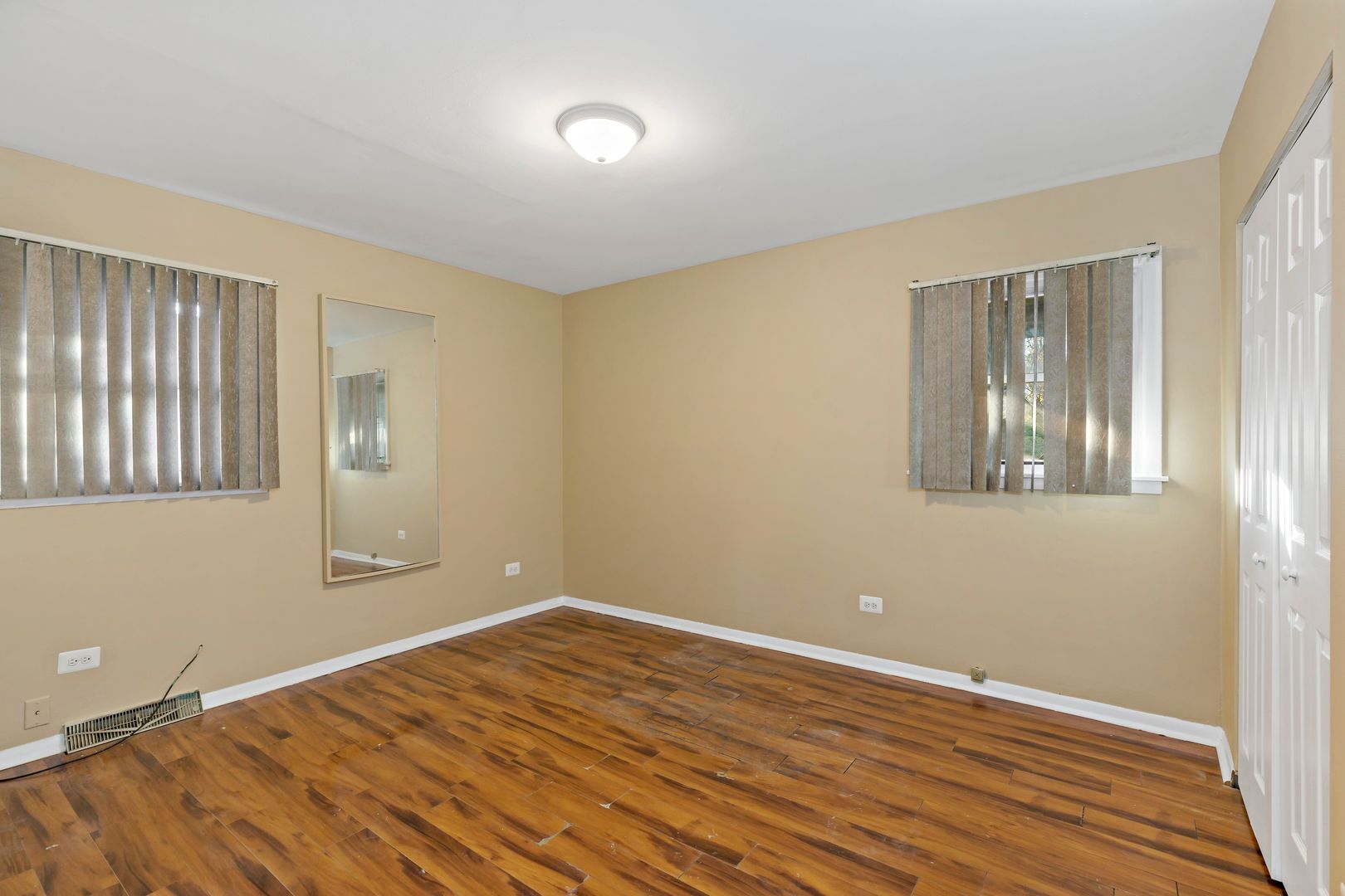 18740 Springfield Avenue Flossmoor, IL 60422 - Photo 11 of 16 a view of empty room with wooden floor and fan