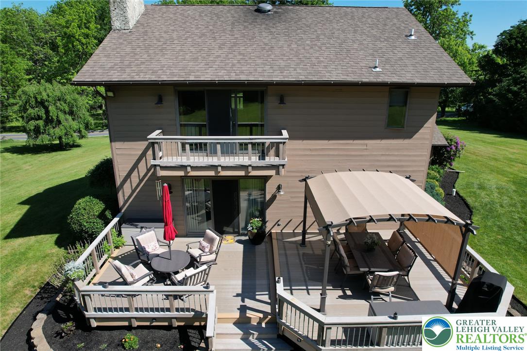 3470 Brodhead Road Bethlehem, PA 18020 - Photo 15 of 84 Multi-level wooden deck provides ample space for outdoor entertaining, complete with a covered dining area.