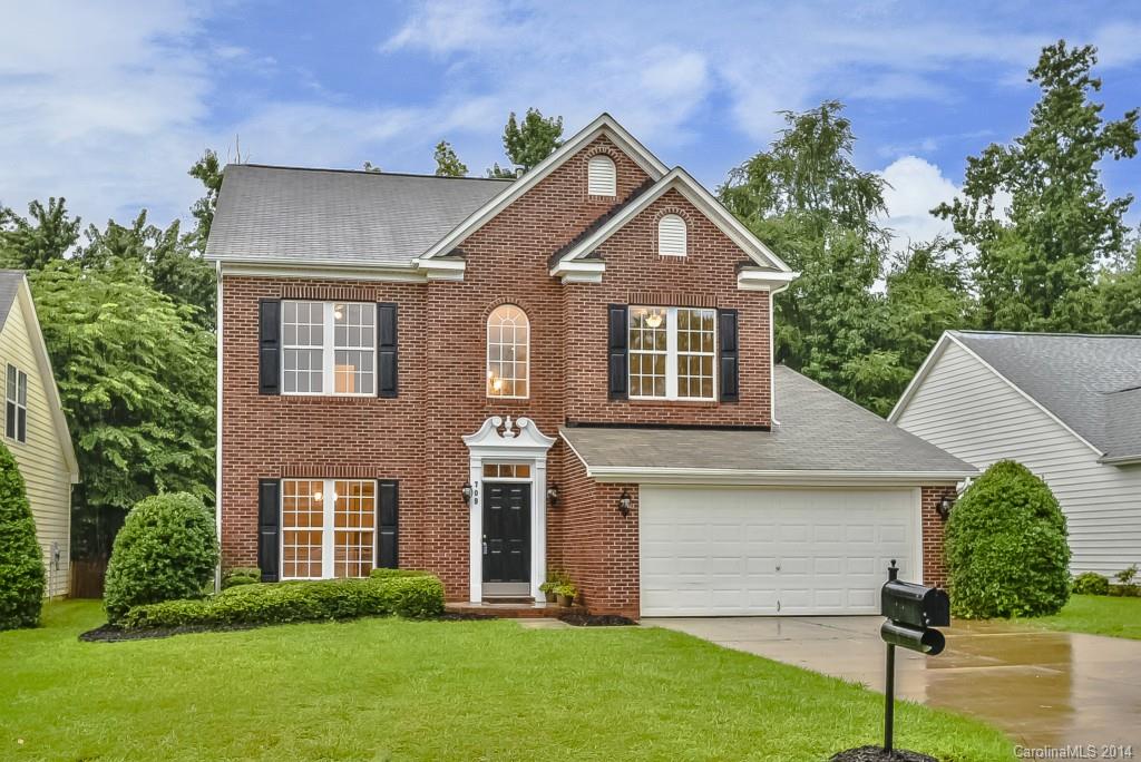 709 Warwick Way Fort Mill, SC 29708 - Photo 1 of 24 a front view of a house with a yard