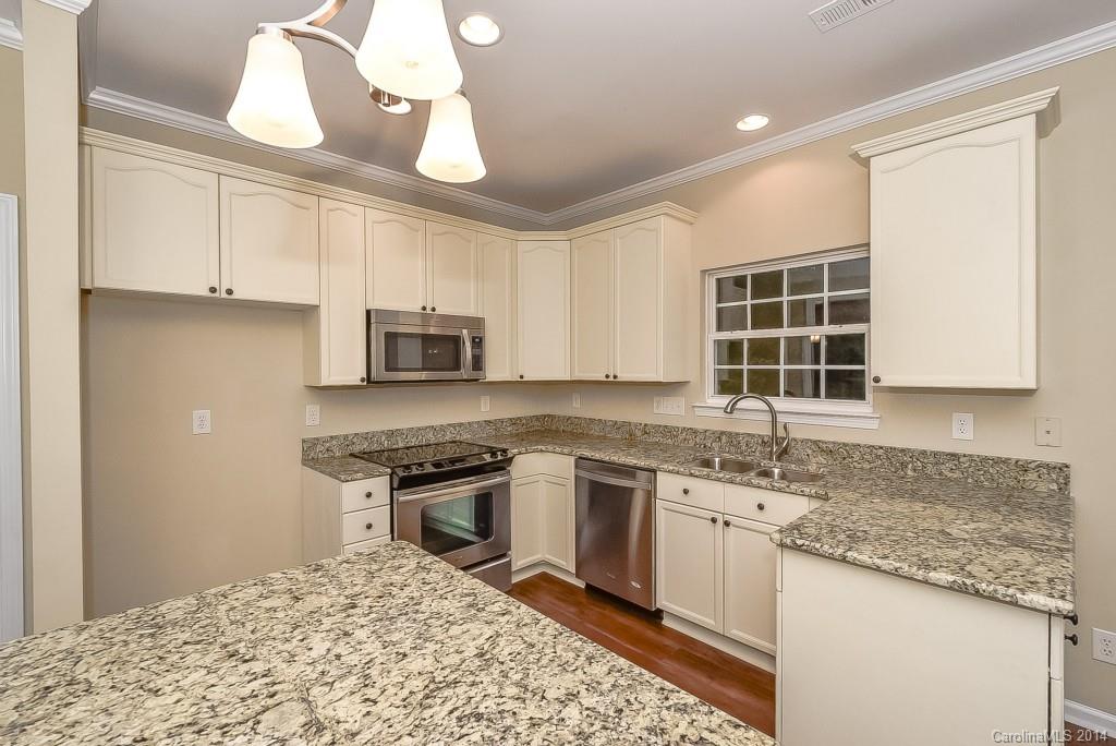 709 Warwick Way Fort Mill, SC 29708 - Photo 12 of 24 a kitchen with a stove sink and microwave