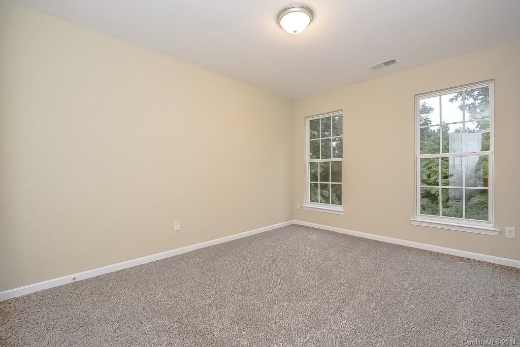 709 Warwick Way Fort Mill, SC 29708 - Photo 20 of 24 an empty room with windows
