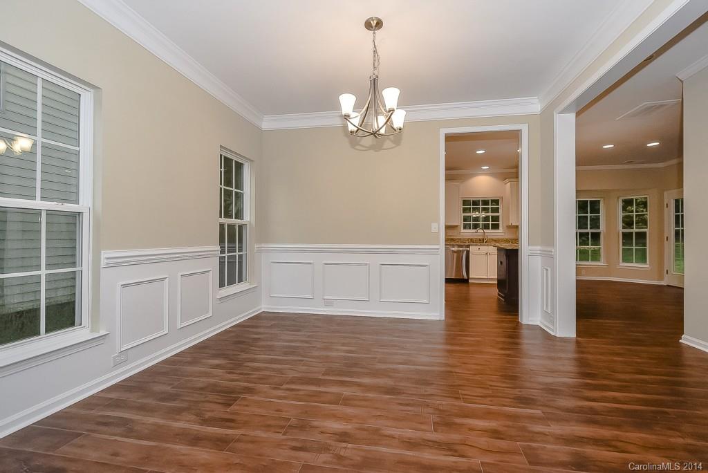 709 Warwick Way Fort Mill, SC 29708 - Photo 6 of 24 a view of empty room with wooden floor and fan