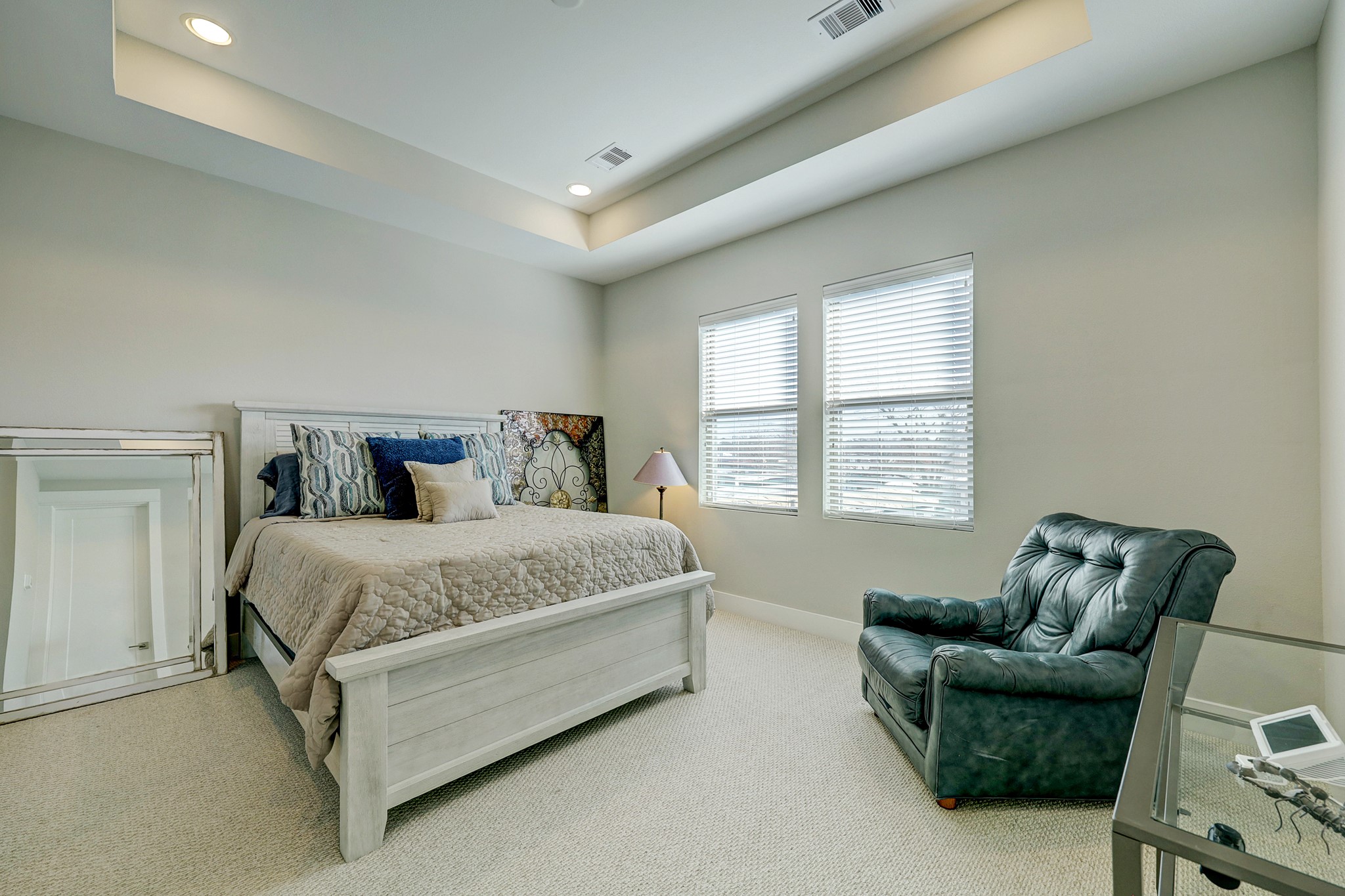 806 Thornton Road, Unit A Houston, TX 77018 - Photo 11 of 15 a spacious bedroom with a bed and a couch