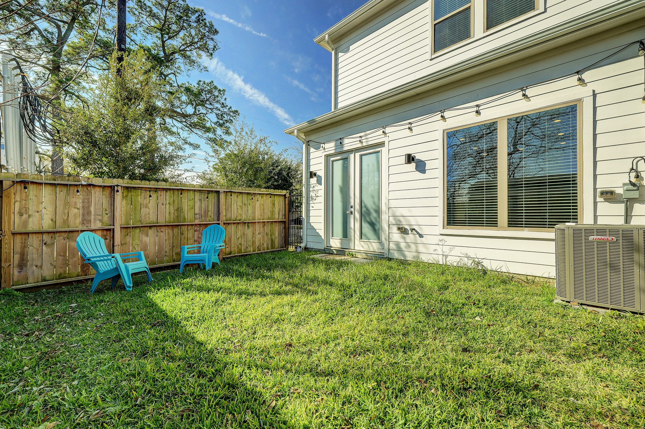 806 Thornton Road, Unit A Houston, TX 77018 - Photo 15 of 15 a backyard of a house with wooden floor and fence