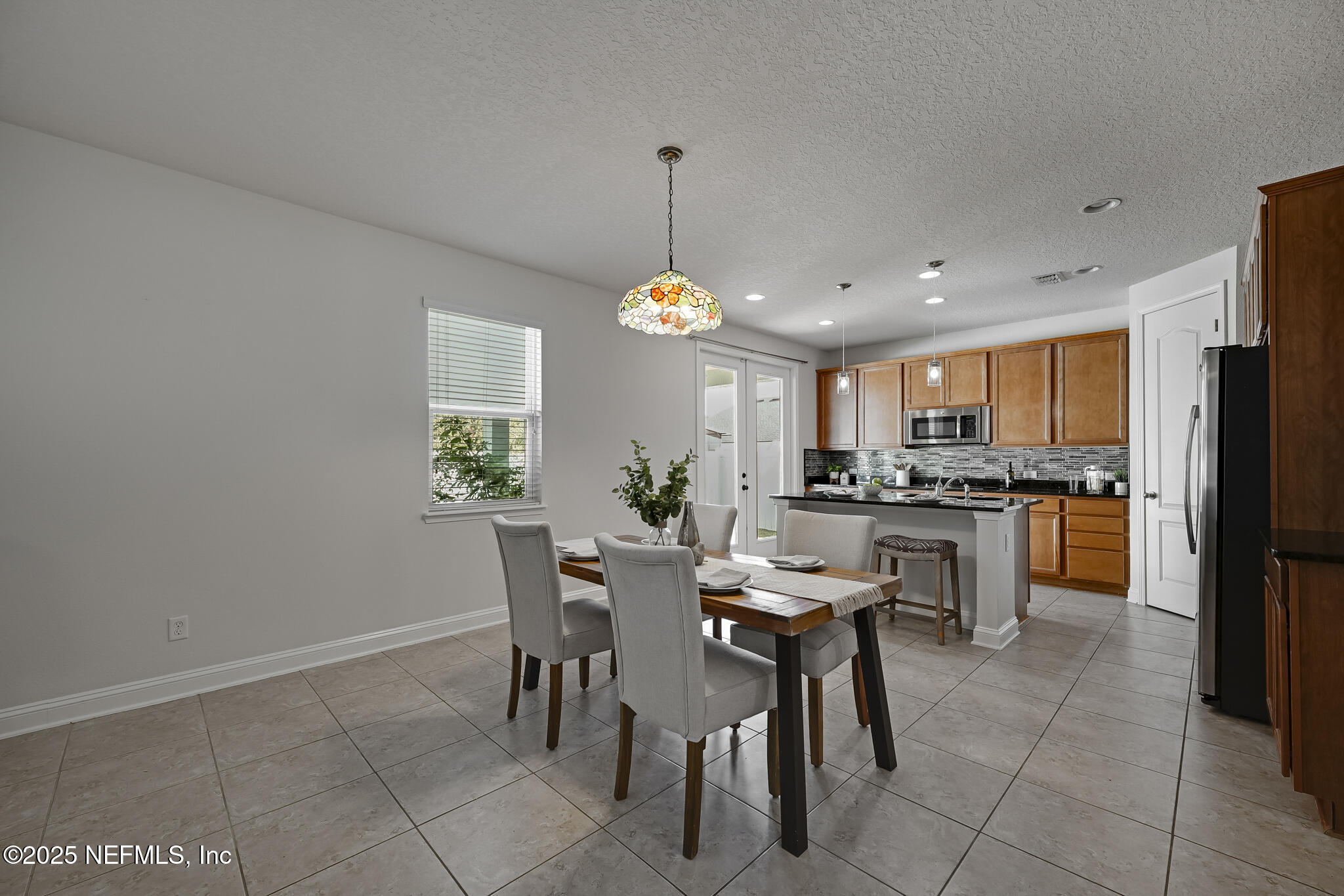 70 Quartz Place St. Augustine, FL 32086 - Photo 27 of 43 26 Dining Room and Kitchen