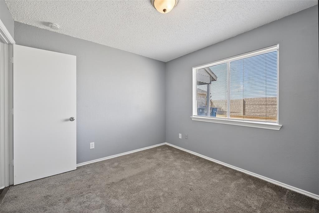 4407 Lashley Drive Dallas, TX 75232 - Photo 33 of 39 a view of an empty room with a window