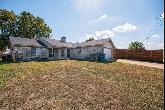 a house view with a garden space