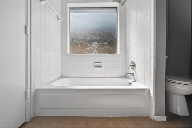 a bathroom with a bathtub