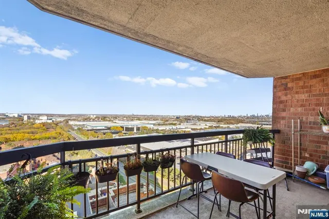 a view of a balcony with an ocean view