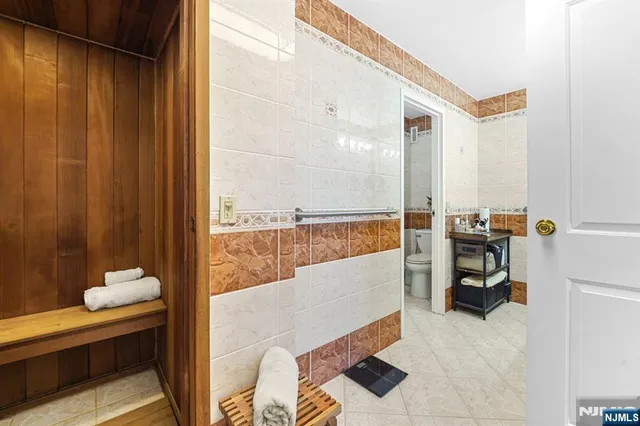 a picture of a bench in front of a door