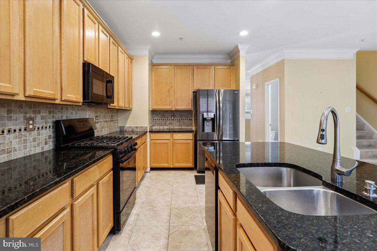 2943 St Helen Circle Silver Spring, MD 20906 - Photo 14 of 40 Modern kitchen with sleek finishes.