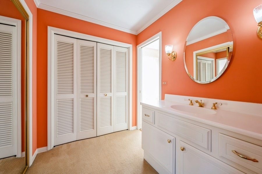 2961 Cherry Lane Northbrook, IL 60062 - Photo 12 of 21 a bathroom with a sink and a mirror