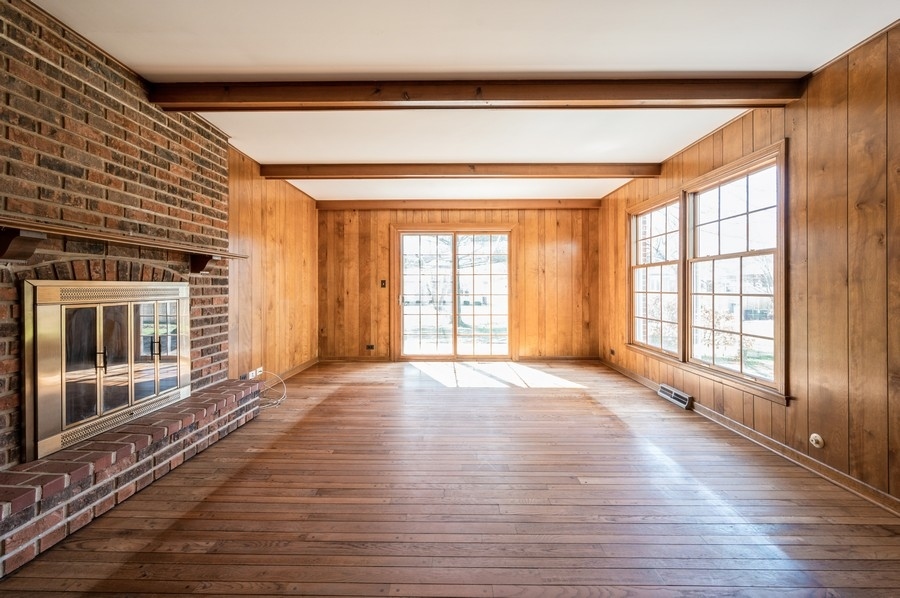 2961 Cherry Lane Northbrook, IL 60062 - Photo 8 of 21 a view of an empty room with wooden floor and a window