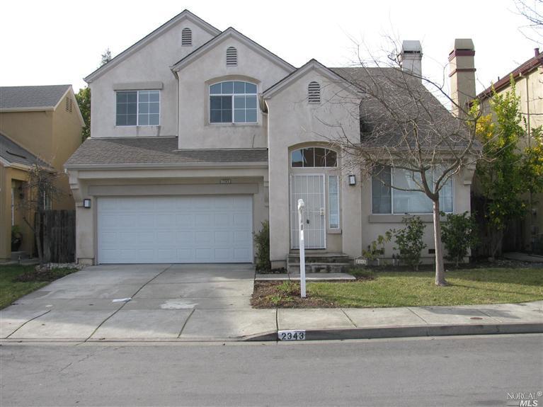 2343 Wicket Avenue Santa Rosa, CA 95403 - Photo 1 of 1 a front view of a house with a yard and garage