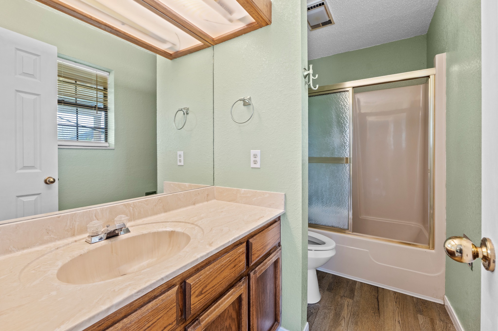205 Sedro Trail Georgetown, TX 78633 - Photo 22 of 32 A well-maintained bathroom with a spacious vanity, large mirror, and full shower.