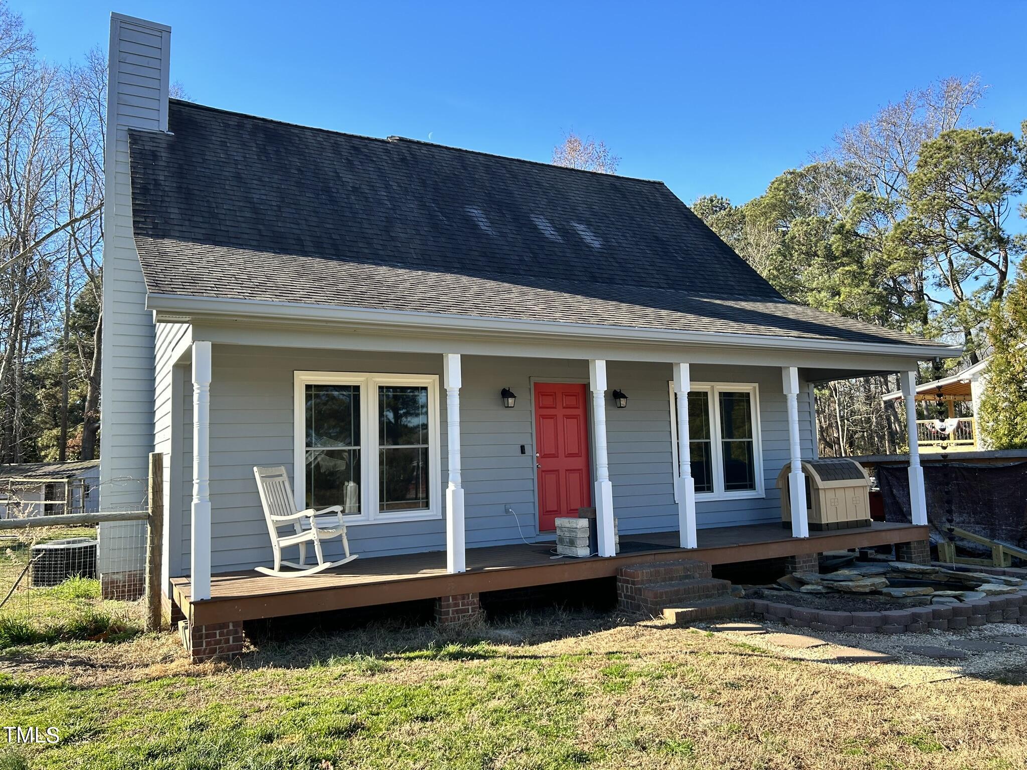 13535 Cleveland Road Garner, NC 27529 - Photo 1 of 18 a view of house with swimming pool and porch