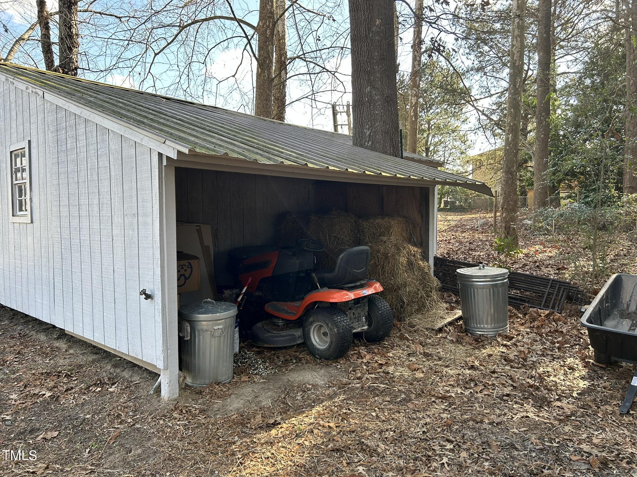 13535 Cleveland Road Garner, NC 27529 - Photo 16 of 18 a view of car parked in yard