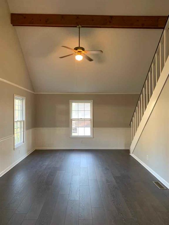 846 Idlewood Road Winder, GA 30680 - Photo 7 of 27 a view of an empty room with wooden floor and a window