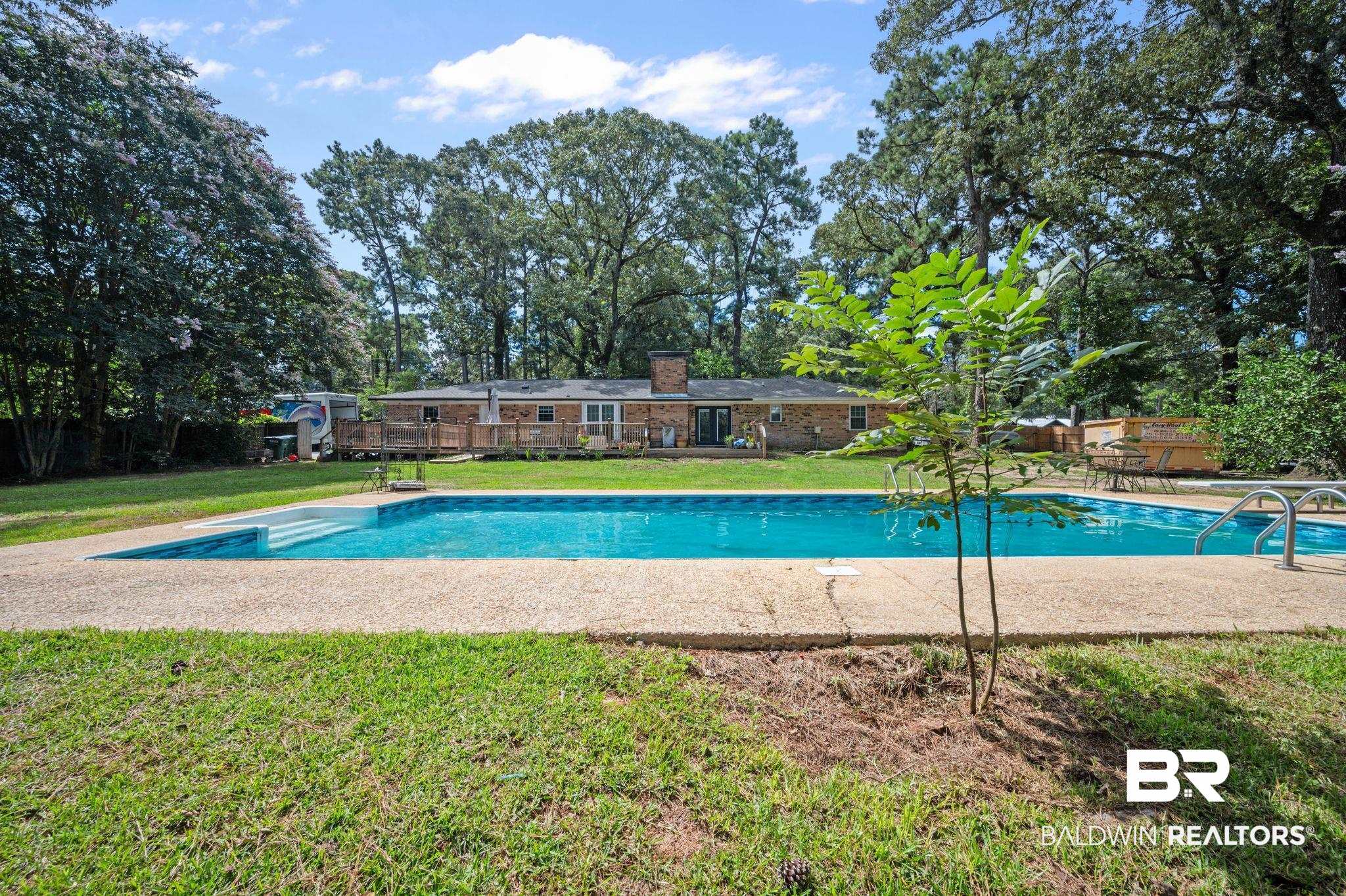 620 Southern Way Spanish Fort, AL 36527 - Photo 16 of 18 View of swimming pool with a yard