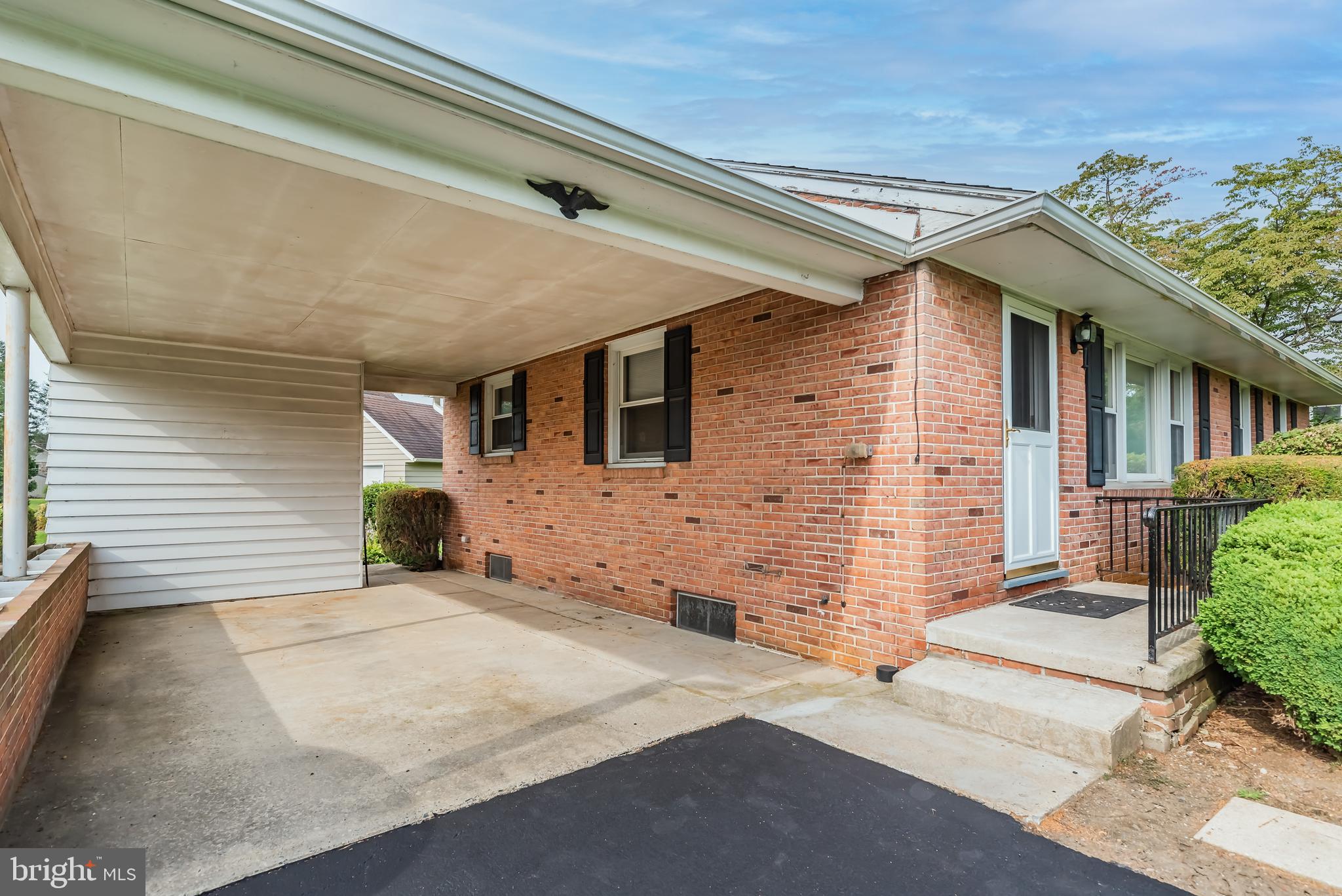 166 Highland Road Chambersburg, PA 17202 - Photo 19 of 24 Carport with storage and easy ingress/ egress