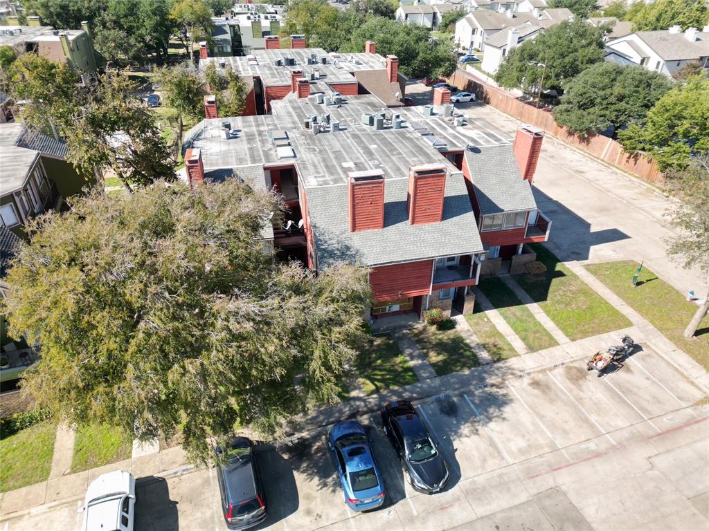 9839 Walnut Street, Unit 306 Dallas, TX 75243 - Photo 26 of 33 an aerial view of a house with a yard basket ball court and outdoor seating